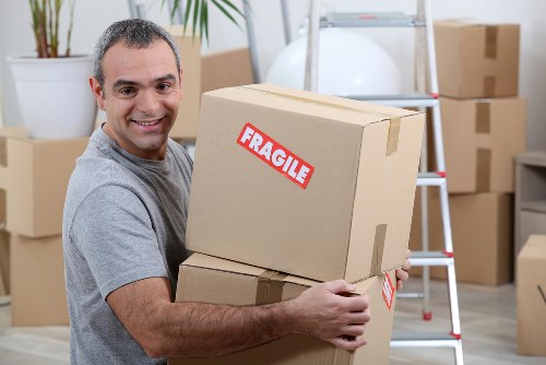 Packed office furniture and technology ready for transport