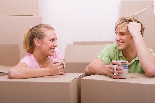 Professional flat removals service in Clapham Common with moving van and boxes