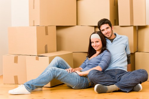Careful packing of fragile items for a London home move