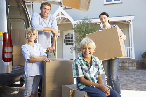 Careful loading of household furniture into a removal van